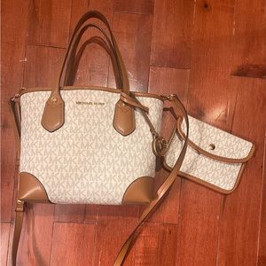 Michael Kors bucket style purse with strap and envelope style wallet